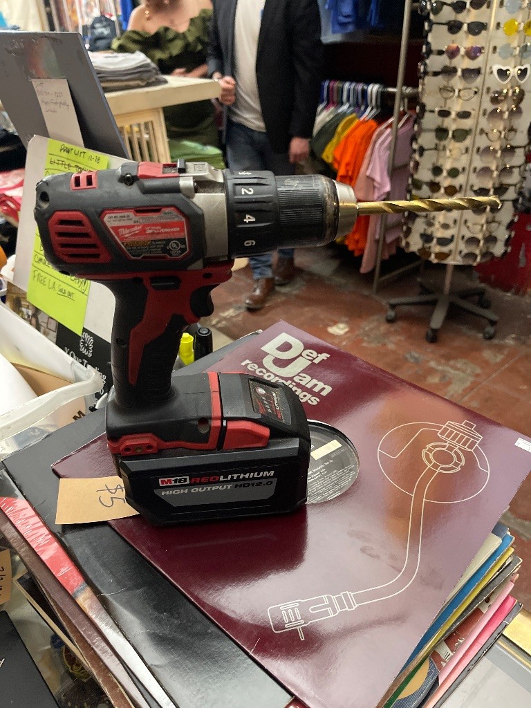 Milwaukee M18 FUEL cordless drill/driver with M18 REDLITHIUM High Output HD12...